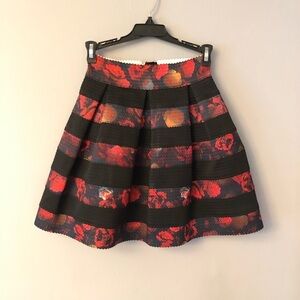 Guess skirt size x small rose detail. Cute for Valentine’s Day
